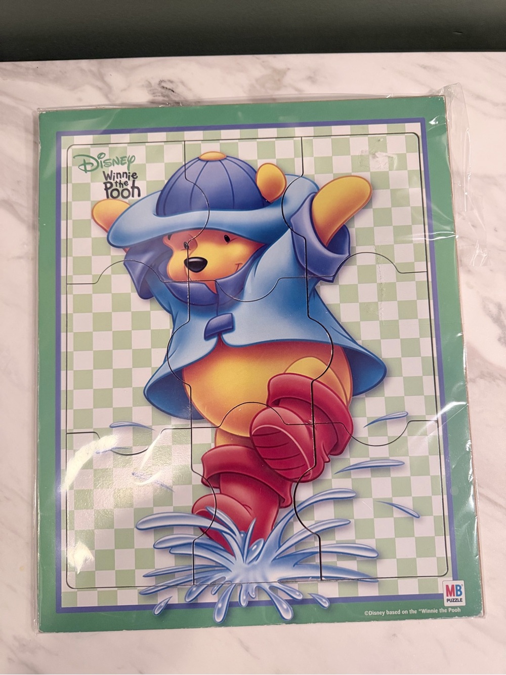Disney Winnie the Pooh Puzzle with Blue Raincoat and Red Boots